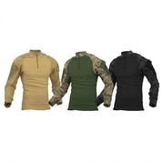 Imagem Principal / Frente: Combat Shirt Vanguard da Fox Boy nas cores preta e camuflada, com gola mandarim e bolsos com velcro nos braços.